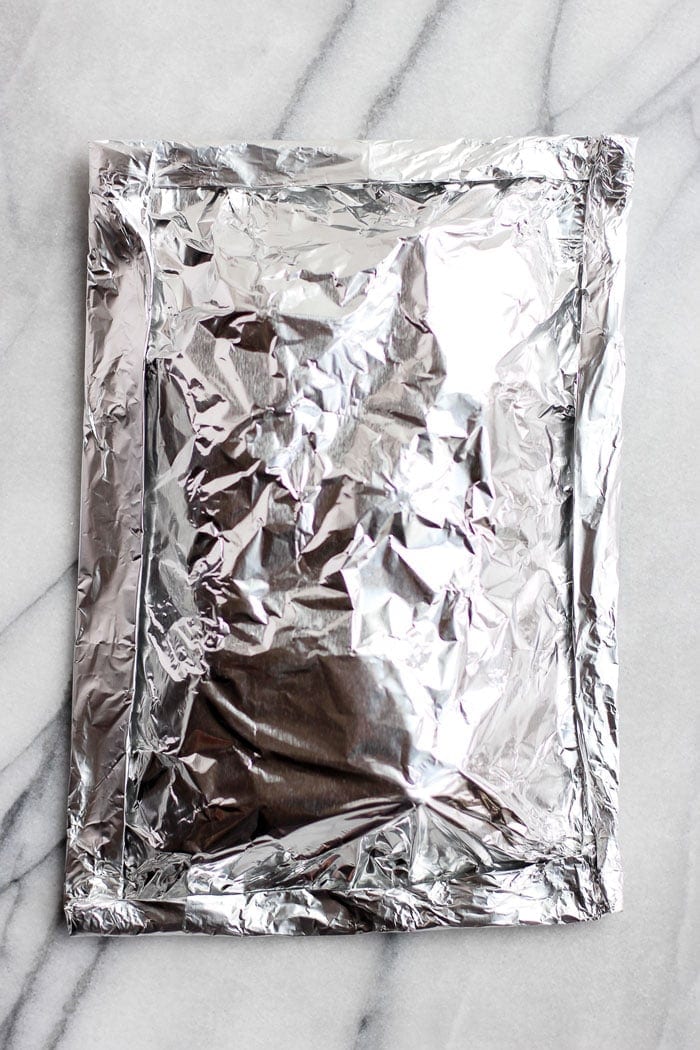 My go-to summer side dish! These foil pack grilled potatoes are crispy on the outside, perfectly tender inside, and ready in 30 minutes. foil pack of potatoes