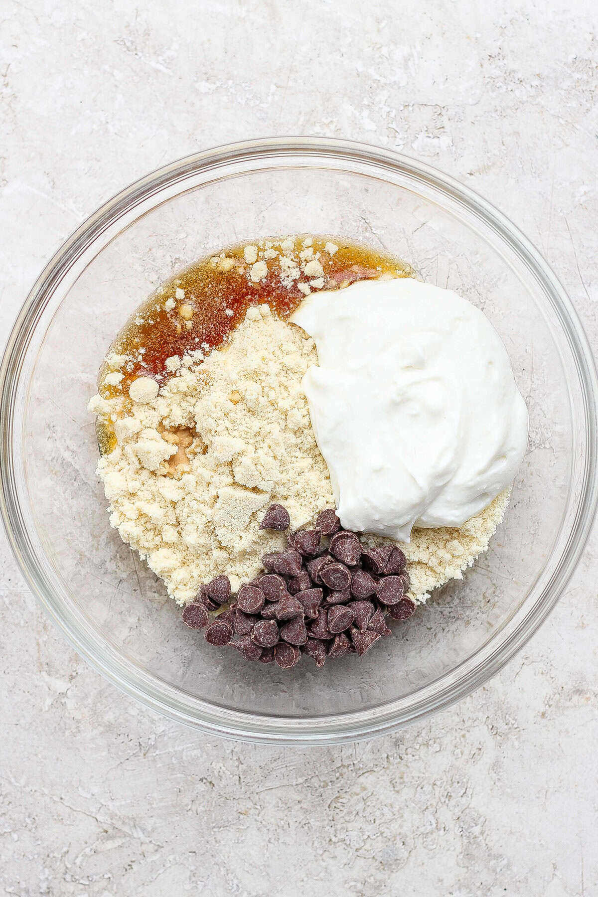 cottage cheese cookie dough ingredients combined in a mixing bowl