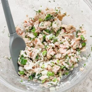 cottage cheese tuna salad mixed in glass bowl
